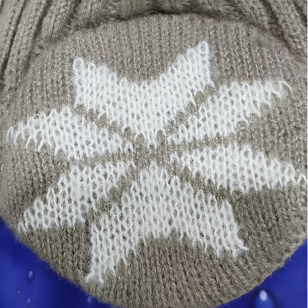 Bonnet cache-oreille tricoté motif flocon hiver | Esprit Baroudeur